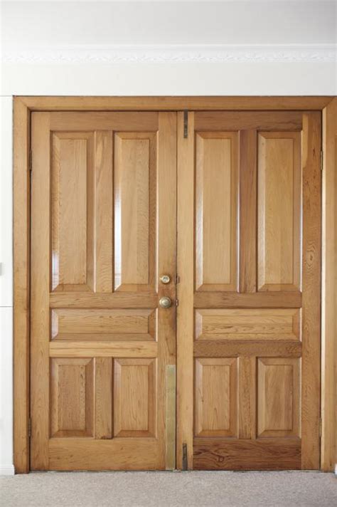 Free Image of Modern double wooden front door | Freebie.Photography