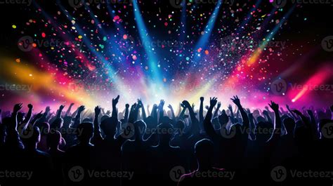 Concert crowd with colorful stage lights and confetti 27103230 Stock Photo at Vecteezy