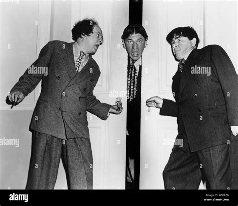 DON'T THROW THAT KNIFE, from left: Larry Fine, Shemp Howard, Moe Howard ...