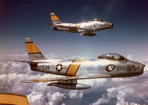 F-86F Sabres of the 336th Fighter-Interceptor Group in-flight over Korea during the early summer ...