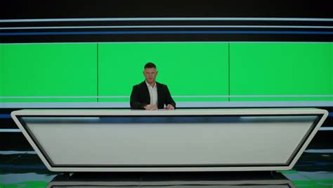 GREEN SCREEN CHROMA KEY Caucasian male anchorman reporting on a story ...