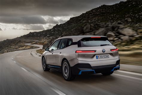 BMW launches its new flagship iX electric SUV with 300 miles of range ...