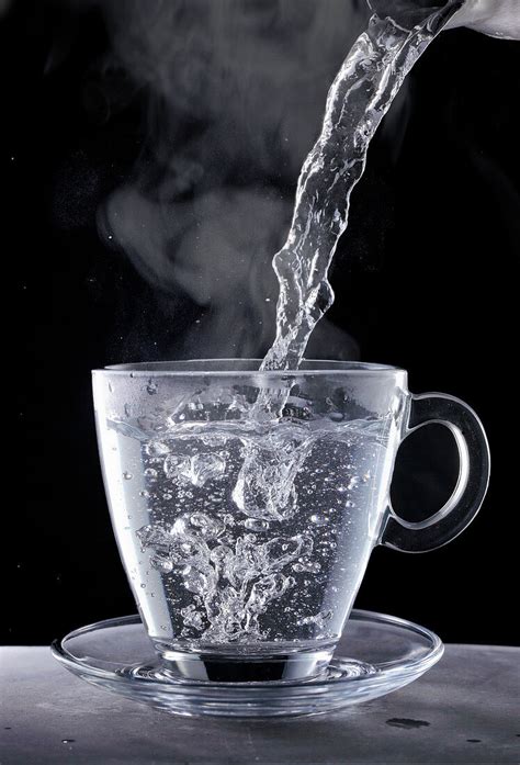 Boiling water being poured into a glass … – License Images – 12568468 StockFood