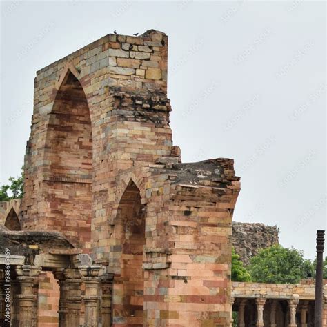 Inside the Qutub Minar Complex with antic ruins and inner square ...