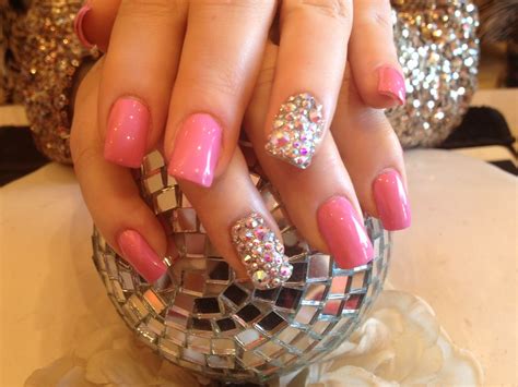 Acrylic nails with pink polish and Swarovski crystals on r… | Flickr