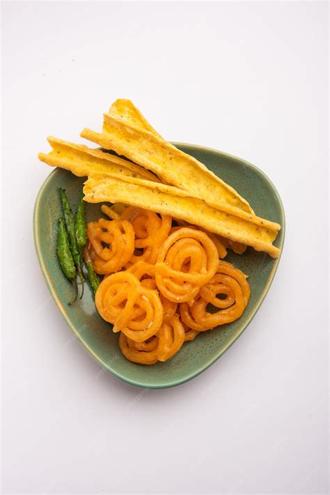 Premium Photo | Crispy Fafda with sweet jalebi is an Indian snack most popular in Gujarat ...