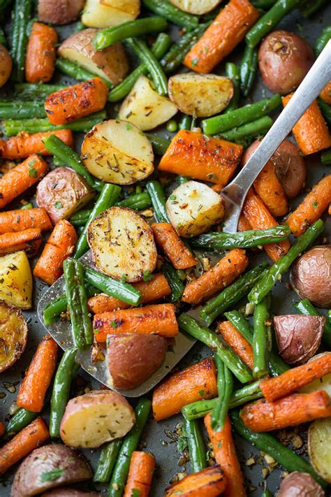 how long to roast potatoes and carrots in oven