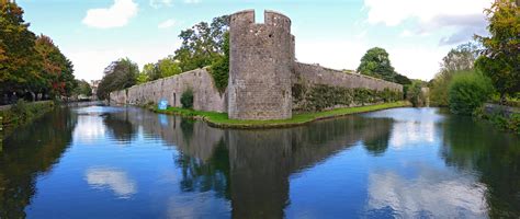 Photographs of Bishop's Palace, Somerset, England: Southern moat, and corner tower