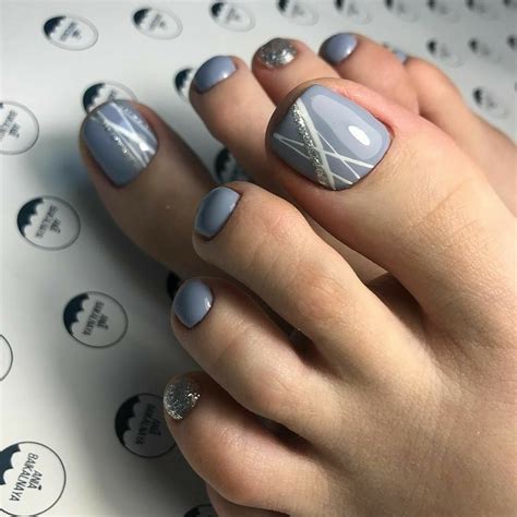 Glittered and white lines on blue-grey | Pedicure designs toenails, Summer toe nails, Cute toe nails