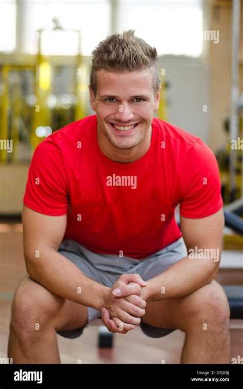 Guy sitting lifting leg hi-res stock photography and images - Alamy