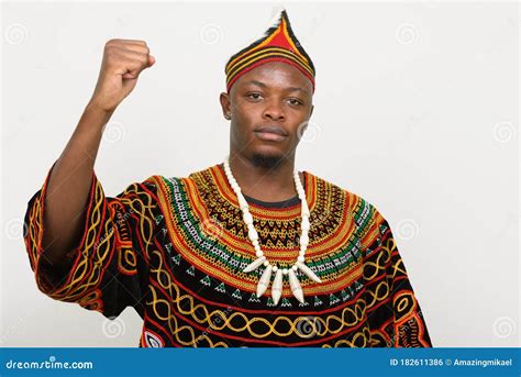 Young Handsome African Man in Traditional Clothing with Fist Raised ...