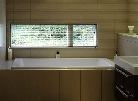 I like this low, long, narrow horizontal window - this would be good in a kitchen - enabling you ...