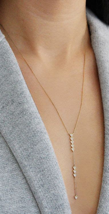 This delicately crafted lariat pairs perfectly with both plunging and high necklines. #diamonds ...