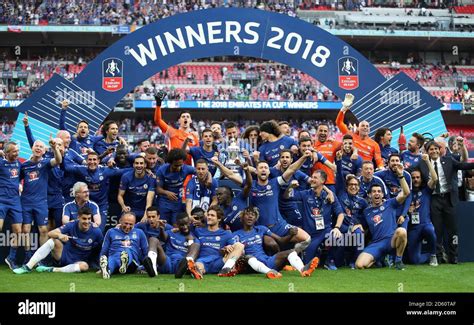 Chelsea players celebrate with the FA Cup trophy Stock Photo - Alamy