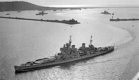 Battleship HMS Duke of York departing Portland Harbour, 1946. Her sister ships HMS Anson and HMS ...