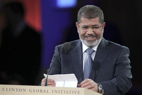 In court, defiant Mohamed Morsi says he is still Egypt’s president