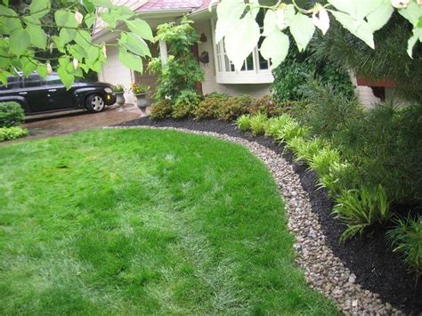 Landscaping with black mulch. Keep color year round with our black rubber mulch. #black #mulch # ...