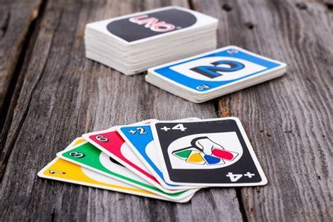 Uno Card Game On Wood Table Editorial Photography - Image: 64991182