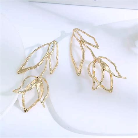 Buy Luxury Alloy Long Leaf & Flower Drop Design Earrings | Aadiraa by ...