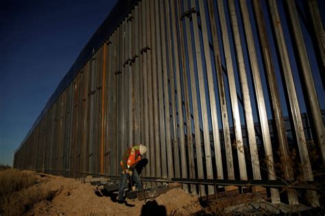 Biden halts border wall building after Trump’s final surge | PBS News