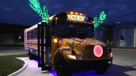 Christmas-themed school bus brings festive cheer to Hays CISD ...