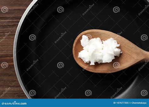 Wooden Spoon with Coconut Oil in Frying Pan, Stock Image - Image of ...