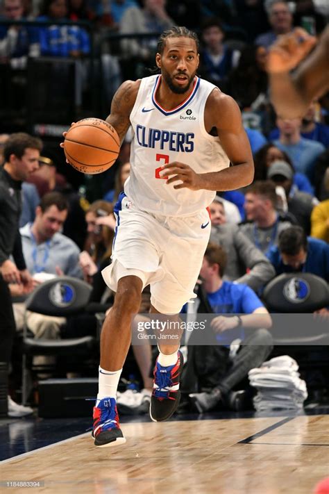 Kawhi Leonard of the LA Clippers handles the ball against the Dallas ...