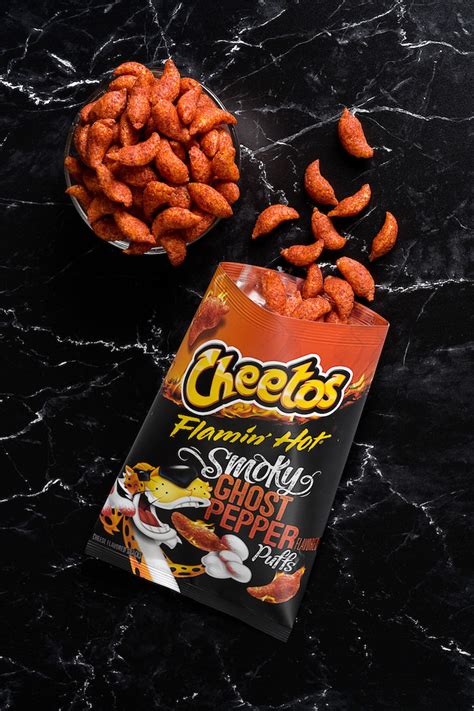 Cheetos Is Turning Up The Heat With A New Spicy Chip That Should Be Paired With a Glass of Milk