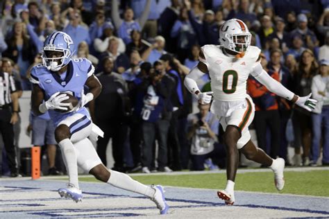 Devontez Walker scores 3 TDs as No. 12 North Carolina cruises past No. 25 Miami - Yahoo Sports