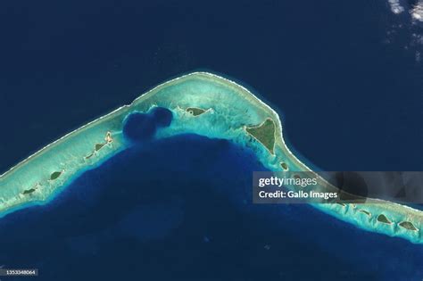 Satellite image of Enewetak Atoll nuclear test craters. News Photo - Getty Images