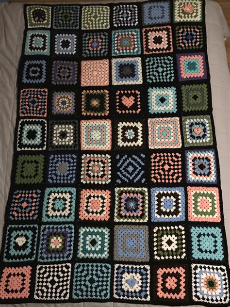 Scrap yarn granny square blanket (several squares have unique meanings ...