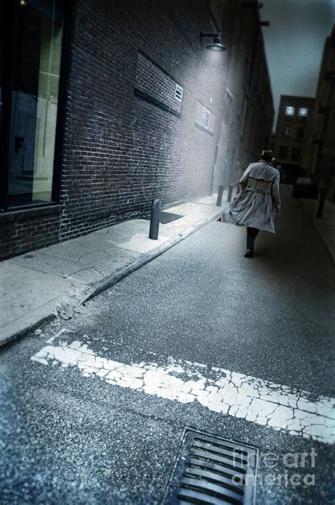 Man Walking Down A Dark Alley Photograph by Jill Battaglia