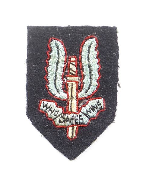 Special Air Service late WW2 SAS beret badge in INFANTRY