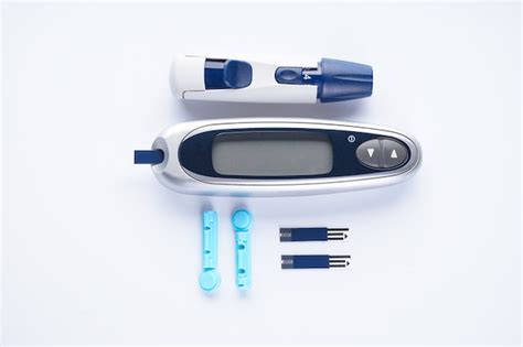 Premium Photo | Digital glucometer, lancet pen isolated on a white ...