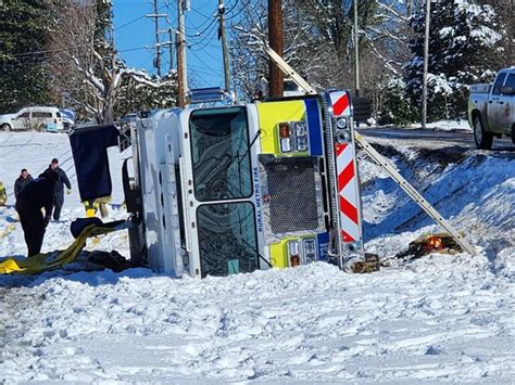 Rural Metro (TN) Fire Pumper Slides Off Road, Ends Up on Side