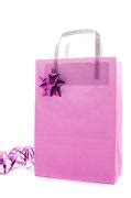 Photo of Pink Christmas shopping or gift bag | Free christmas images