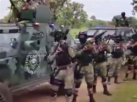 Mexican drug cartel shows off uniformed troops with military weapons and armoured vehicles in ...