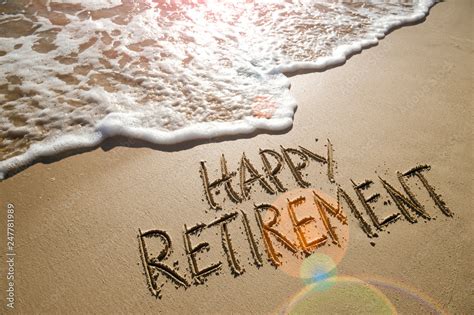 Happy Retirement message handwritten on smooth sand beach with gentle wave Stock Photo | Adobe Stock