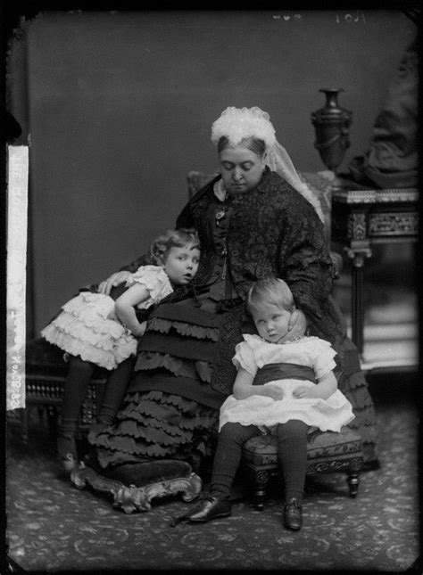 Queen Victoria with two grandchildren, 1885. The grandchildren are siblings Princess Margaret of ...