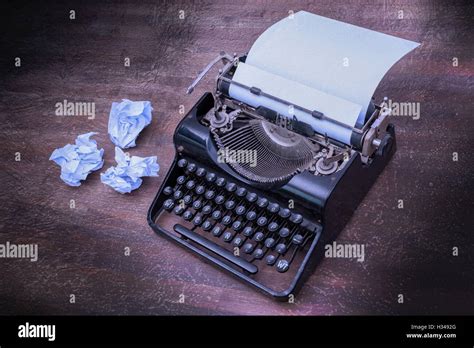 Vintage typewriter and old books Stock Photo - Alamy