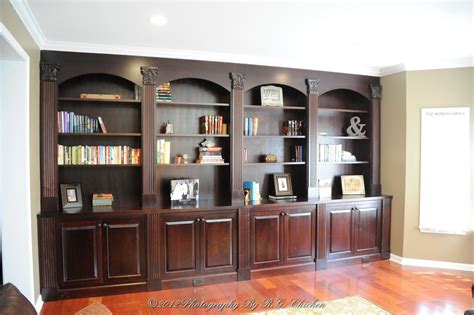 Custom Made Wall Unit With Bookshelves And Storage by Oak Mountain Custom Woodwork | CustomMade.com