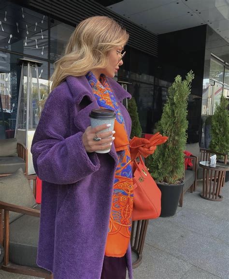 Victoria fox in a classy purple and Orange outfit - Slaylebrity