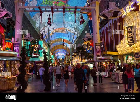 Las Vegas, Nevada. Fremont Street. Four Zip Line Riders on the Zoomline ...