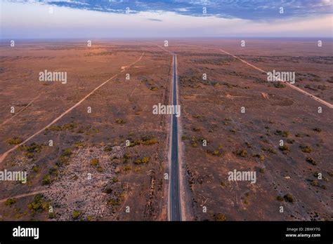 Aerial view at dawn of the long road across the Nullarbor Plain in Western Australia Stock Photo ...