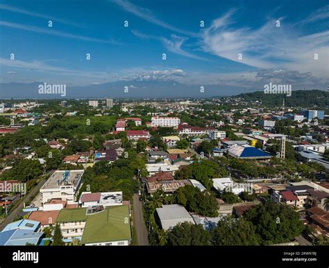 Cityscape of Davao City with buildings and green trees. Mindanao ...