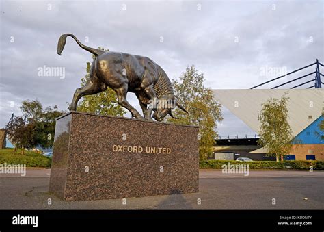 Oxford Oxfordshire UK - Oxford United The Kassam Stadium with a bronze Ox bull statue outside ...