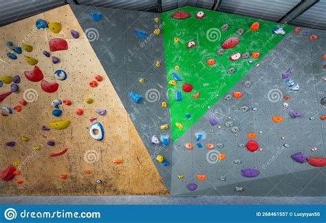 Large Indoor Traverse Climbing Wall with Many Coloured Holds and Grips ...