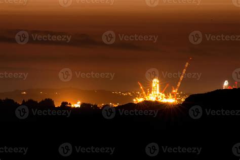 Offshore Rig in the night 1099061 Stock Photo at Vecteezy