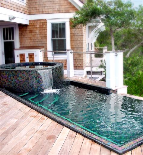 Stainless steel pool and spa on a beautiful home deck. | Small pool design, Backyard pool, Small ...