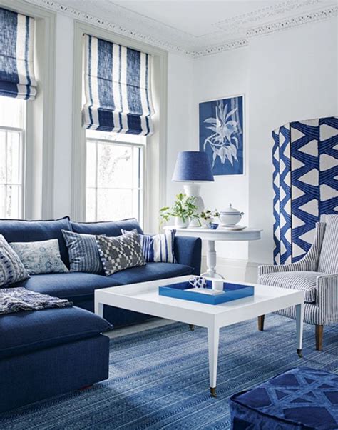 a living room with blue and white decor